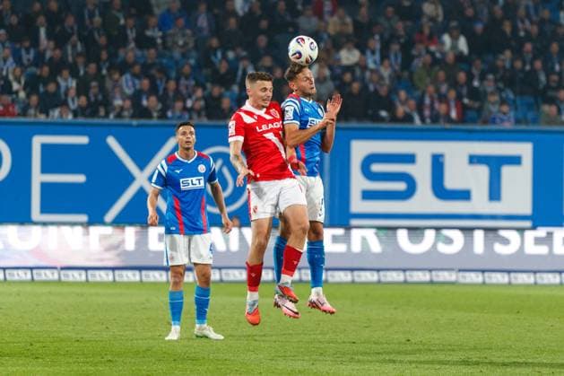 left Erik Engelhardt FCE vs Marco Schuster Rostock GER, FC Hansa Rostock vs FC Energie Cottbus, Soccer, Men, 3 Liga, 09 Matchday, Season 2025 2026, 30 09 2025 Rostock Ostseestadion Mecklenburg Vorpommern Germany