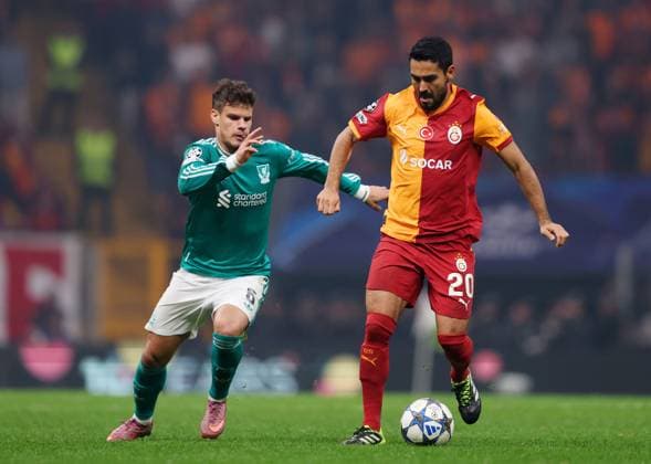 Ilkay Gündogan of Galatasaray is challenged by Milos Kerkez of Liverpool Galatasaray v Liverpool, UEFA Champions League, Group Stage, Football, RAMS Park, Istanbul, Turkey - 30 Sep 2025Istanbul RAMS Park Turkey EDITORIAL USE ONLY No use with unauthorised audio, video, data, fixture lists, club league logos or live services. Online in-match use limited to 120 images, no video emulation. No use in betting, games or single club league player publications.  Copyright: xRaddadxJebarah Shutterstockx 15504034bh