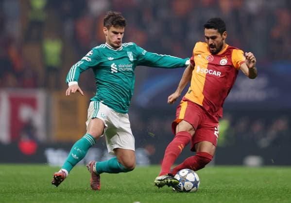 Ilkay Gündogan of Galatasaray is challenged by Milos Kerkez of Liverpool Galatasaray v Liverpool, UEFA Champions League, Group Stage, Football, RAMS Park, Istanbul, Turkey - 30 Sep 2025Istanbul RAMS Park Turkey EDITORIAL USE ONLY No use with unauthorised audio, video, data, fixture lists, club league logos or live services. Online in-match use limited to 120 images, no video emulation. No use in betting, games or single club league player publications.  Copyright: xRaddadxJebarah Shutterstockx 15504034bi