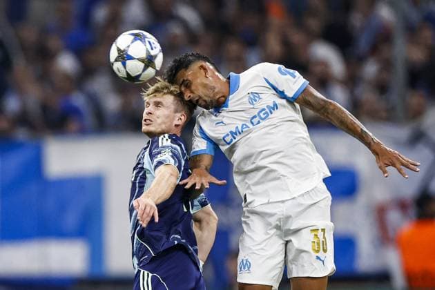 MARSEILLE - (l-r) Oliver Edvardsen of Ajax, Emerson of Olympique Marseille during the UEFA Champions League match between Olympique Marseille and Ajax at the Stade Velodrome on September 30, 2025, in Marseille, France. ANP MAURICE VAN STEEN xVIxANPxSportx xxANPxIVx 537976622 originalFilename: 537976622.jpg