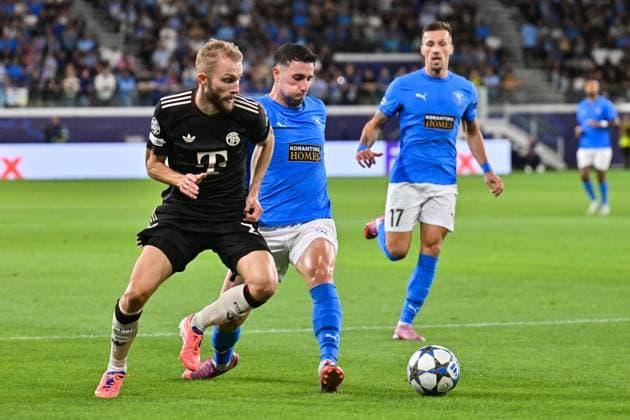 UEFA Champions League Paphos FC FC Bayern Munich 30 09 2025 in duel Konrad LAIMER FC Bayern Muenchen 27 and Kostas PILEAS Paphos FC 2 duel UEFA Champions League Paphos FC FC Bayern Munich Alphamega Stadium on 30 09 2025 Copyright: xBEAUTIFULxSPORTS Goldbergx