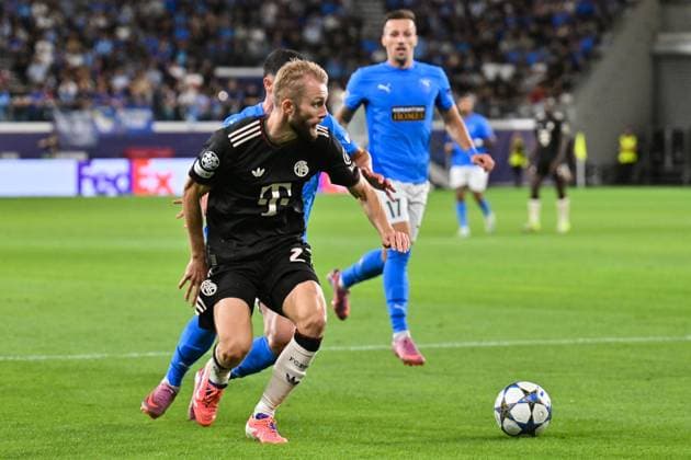 UEFA Champions League Paphos FC FC Bayern Munich 30 09 2025 in duel Konrad LAIMER FC Bayern Muenchen 27 and Kostas PILEAS Paphos FC 2 duel UEFA Champions League Paphos FC FC Bayern Munich Alphamega Stadium on 30 09 2025 Copyright: xBEAUTIFULxSPORTS Goldbergx