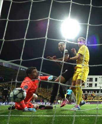 Jostein Gundersen of Bodo Glimt scores an own goal under pressure from Richarlison of Tottenham Hotspur FK Bodo Glimt v Tottenham Hotspur, UEFA Champions League, Group Stage, Football, Aspmyra Stadion, Bodo, Norway - 30 Sep 2025Bodo Aspmyra Stadion Norway EDITORIAL USE ONLY No use with unauthorised audio, video, data, fixture lists, club league logos or live services. Online in-match use limited to 120 images, no video emulation. No use in betting, games or single club league player publications.  Copyright: xMichaelxZemanek Shutterstockx 15504026ar