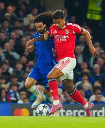 Marc Cucurella of Chelsea battles with Richard Rios of Benfica Chelsea v Benfica, UEFA Champions League, Group Stage, Football, Stamford Bridge, London, UK - 30 Sep 2025London Stamford Bridge United Kingdom EDITORIAL USE ONLY No use with unauthorised audio, video, data, fixture lists, club league logos or live services. Online in-match use limited to 120 images, no video emulation. No use in betting, games or single club league player publications. Copyright: xJavierxGarcia Shutterstockx 15504031bs