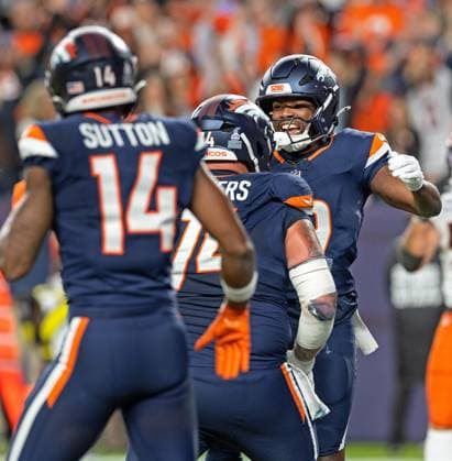 September 30, 2025, Denver, Colorado, USA: Broncos WR MARVIN MIMS JR. celebrates with team mates after a TD catch in the 1st. Half at Empower Field at Mile High Monday night. Broncos beat the Bengals 28-3. Denver USA - ZUMAav4_ 20250930_zaf_av4_020 Copyright: xHectorxAcevedox