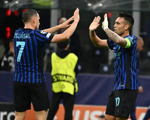 (251001) -- MILAN, Oct. 1, 2025 -- Inter Milan s Lautaro Martinez (R) celebrates his second goal with his teammate Piotr Zielinski during the UEFA Champions League match between Inter Milan and Slavia Praha in Milan, Italy, Sept.30, 2025. (SP)ITALY-MILAN-FOOTBALL-UEFA CHAMPIONS LEAGUE-INTER MILAN VS SLAVIA PRAHA LixJing 