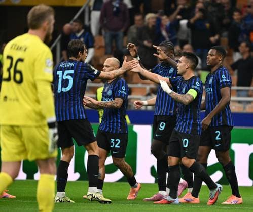 (251001) -- MILAN, Oct. 1, 2025 -- Inter Milan s Lautaro Martinez (2nd R) celebrates his goal with his teammates during the UEFA Champions League match between Inter Milan and Slavia Praha in Milan, Italy, Sept.30, 2025. (SP)ITALY-MILAN-FOOTBALL-UEFA CHAMPIONS LEAGUE-INTER MILAN VS SLAVIA PRAHA LixJing 