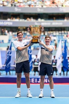 BEIJING, CHINA - OCTOBER 01: Henry Patten of Great Britain and Harri Heliovaara of Finland pose with the trophy during the medal ceremony following the Men s Doubles Final match against Karen Khachanov and Andrey Rublev on day 10 of the 2025 China Open at the National Tennis Center on October 1, 2025 in Beijing, China.  Copyright: xVCGx 111594379385
