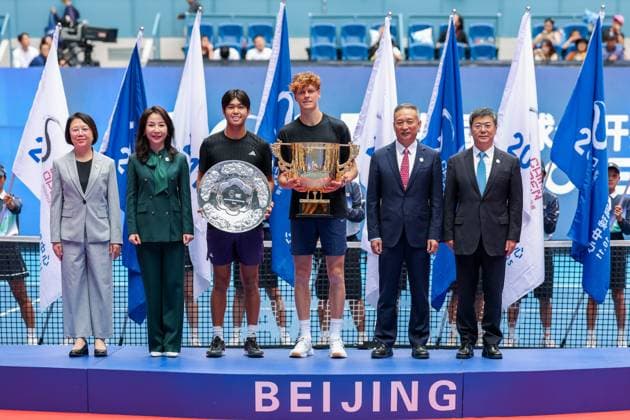 BEIJING, CHINA - OCTOBER 01: Champion Jannik Sinner of Italy, runner-up Learner Tien of the United States, pose with trophies after the Men s Singles Final match on day 10 of the 2025 China Open at the National Tennis Center on October 1, 2025 in Beijing, China.  Copyright: xVCGx 111594391036