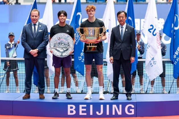 BEIJING, CHINA - OCTOBER 01: Champion Jannik Sinner of Italy, runner-up Learner Tien of the United States, pose with trophies after the Men s Singles Final match on day 10 of the 2025 China Open at the National Tennis Center on October 1, 2025 in Beijing, China.  Copyright: xVCGx 111594390952