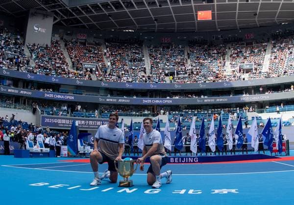(251001) -- BEIJING, Oct. 1, 2025 -- Harri Heliovaara(R) Henry Patten pose with their trophy after the men s doubles final match between Harri Heliovaara(Finland) Henry Patten (Britain) and Karen Khachanov Andrey Rublev of Russia at 2025 China Open tennis tournament in Beijing, China, Oct. 1, 2025. ) (SP)CHINA-BEIJING-TENNIS-CHINA OPEN-MEN S DOUBLES-FINAL(CN) HuxJingwen 