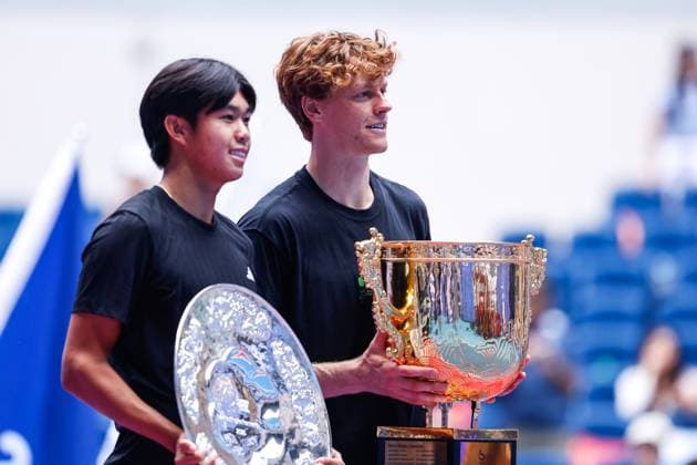 BEIJING, CHINA - OCTOBER 01: Champion Jannik Sinner of Italy, runner-up Learner Tien of the United States, pose with trophies after the Men s Singles Final match on day 10 of the 2025 China Open at the National Tennis Center on October 1, 2025 in Beijing, China.  Copyright: xVCGx 111594395781