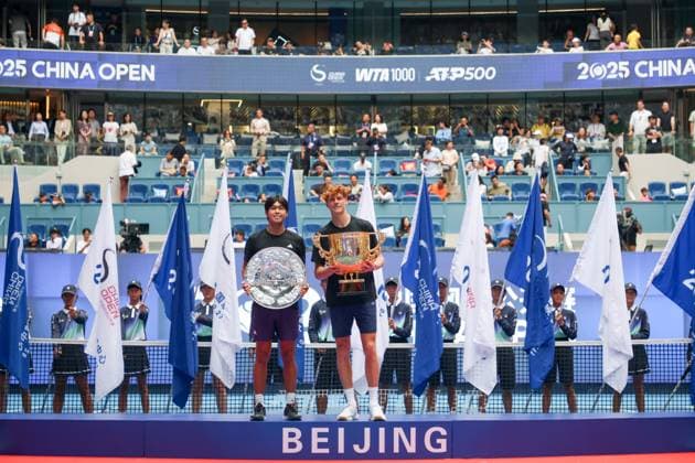 BEIJING, CHINA - OCTOBER 01: Champion Jannik Sinner of Italy, runner-up Learner Tien of the United States, pose with trophies after the Men s Singles Final match on day 10 of the 2025 China Open at the National Tennis Center on October 1, 2025 in Beijing, China.  Copyright: xVCGx 111594395572