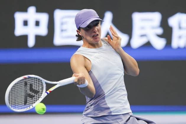 BEIJING, CHINA - OCTOBER 01: Iga Swiatek of Poland competes in the Women s Singles Round of 16 match against Emma Navarro of the United States on day 10 of the 2025 China Open at the National Tennis Center on October 1, 2025 in Beijing, China.  Copyright: xVCGx 111594426636