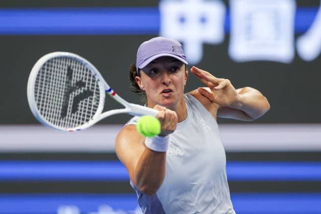 BEIJING, CHINA - OCTOBER 01: Iga Swiatek of Poland competes in the Women s Singles Round of 16 match against Emma Navarro of the United States on day 10 of the 2025 China Open at the National Tennis Center on October 1, 2025 in Beijing, China.  Copyright: xVCGx 111594424961