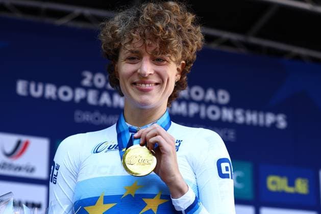 Swiss Marlen Reusser of Movistar Team and pictured on the podium after winning the 24 km time trial of the Women Elite category at the UEC road European cycling championships, Wednesday 01 October 2025, in Loriol-sur-Drome, France. The European cycling championships Drome-Ardeche takes place from 1 to 5 October, France. DAVIDxPINTENS  x135826551x
