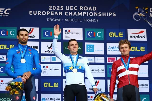L-R, Italian Filippo Ganna, Belgian Remco Evenepoel and Danish Niklas Larsen celebrate on the podium of the 24 km time trial of the Men Elite category at the UEC road European cycling championships, Wednesday 01 October 2025, in Loriol-sur-Drome, France. The European cycling championships Drome-Ardeche takes place from 1 to 5 October, France. DAVIDxPINTENS  x135837561x