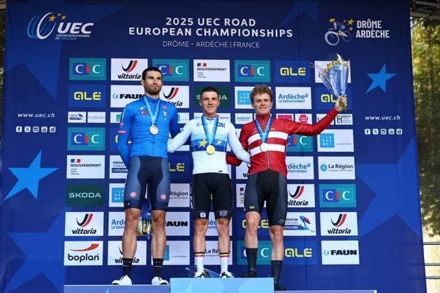 L-R, Italian Filippo Ganna, Belgian Remco Evenepoel and Danish Niklas Larsen celebrate on the podium of the 24 km time trial of the Men Elite category at the UEC road European cycling championships, Wednesday 01 October 2025, in Loriol-sur-Drome, France. The European cycling championships Drome-Ardeche takes place from 1 to 5 October, France. DAVIDxPINTENS  x135838107x