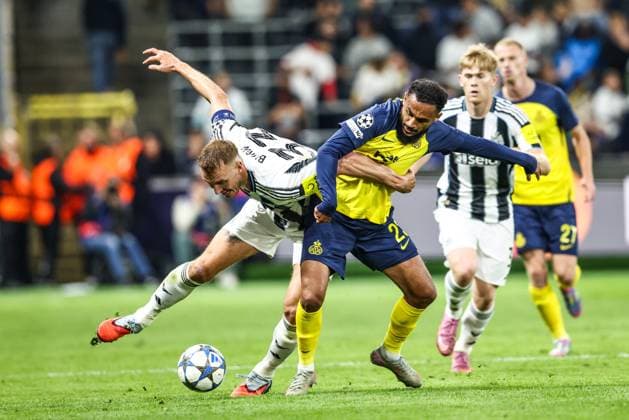 Newcastle?s Dan Burn and Union s Soufiane Boufal fight for the ball during a game between Belgian soccer team Royale Union Saint-Gilloise and English team Newcastle United FC, in Brussels, on Wednesday 01 October 2025, on the second day of the League phase of the UEFA Champions League tournament. BRUNOxFAHY  x135855358x