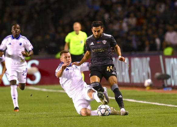 Qarabag v FC Copenhagen - UEFA Champions League BAKU, AZERBAIJAN - OCTOBER 1: Leandro Andrade (15) of Qarabag in action against Rodrigo Huescas (13) of FC Copenhagen during the UEFA Champions League Group Stage second week match between Qarabag and FC Copenhagen at Tofiq Bahramov Stadium in Baku, Azerbaijan on October 1, 2025. Resul Rehimov Anadolu Baku Azerbaijan. Editorial use only. Please get in touch for any other usage.  Copyright: x2025xAnadoluxResulxRehimovx