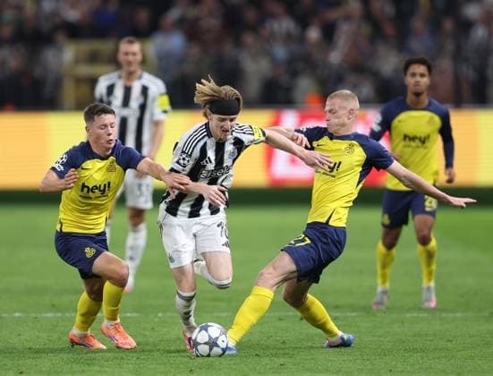 Anderlecht, Belgium, 1st October 2025. Mathias Rasmussen (l) and Louis Patris of Union Saint-Gilloise (r) tackle Anthony Gordon of Newcastle United (c) during the Union Saint-Gilloise vs Newcastle United UEFA Champions League match at The Constant Vanden Stock Stadium, Anderlecht. Picture credit should read: Paul Terry Sportimage EDITORIAL USE ONLY. No use with unauthorised audio, video, data, fixture lists, club league logos or live services. Online in-match use limited to 120 images, no video emulation. No use in betting, games or single club league player publications. SPI_073_PT_Union_Saint_Gilloise_Newcastle SPI-4179-0073