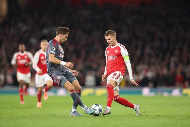 Arsenal FC v Olympiacos FC, Champions League Panagiotis Retsos of Olympiacos and Martin Odegaard of Arsenal during the Arsenal FC v Olympiacos FC UEFA Champions League Round One Group Stage match at the Arsenal Stadium, London, England, United Kingdom on 1 October 2025 Credit: Katie Chan Every Second Media Editorial use only. All images are copyright Every Second Media Limited. No images may be reproduced without prior permission. Copyright: xIMAGO EveryxSecondxMediax ESM-1605-0031 KatiexChanx xEveryxSecondxMediax