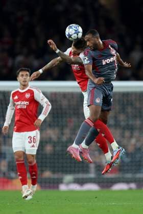 Arsenal FC v Olympiacos FC - UEFA Champions League 2025 26 League Phase MD2 Ben White of Arsenal and Ayoub El Kaabi of Olympiakos challenge during the UEFA Champions League 2025 26 League Phase MD2 match between Arsenal FC and Olympiacos FC at Arsenal Stadium on October 1, 2025 in London, England. London Arsenal Stadium England United Kingdom Copyright: xNigelxFrench Sportsphoto APLx 14136679