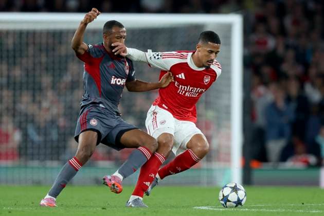 Arsenal FC v Olympiacos FC - UEFA Champions League 2025 26 League Phase MD2 Ayoub El Kaabi of Olympiakos and William Saliba of Arsenal challenge during the UEFA Champions League 2025 26 League Phase MD2 match between Arsenal FC and Olympiacos FC at Arsenal Stadium on October 1, 2025 in London, England. London Arsenal Stadium England United Kingdom Copyright: xNigelxFrench Sportsphoto APLx 14136680