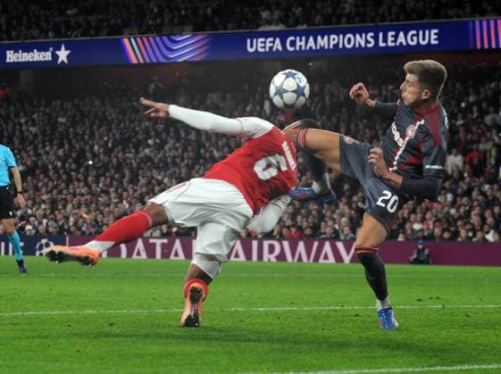 Footall - 2025 2026 UEFA Champions League - league Stage - matchday 2 8 - Arsenal v Olympiakos - Emirates Stadium - Wednesday 1st October 2025 Gabriel of Arsenal dives in with Costinha 