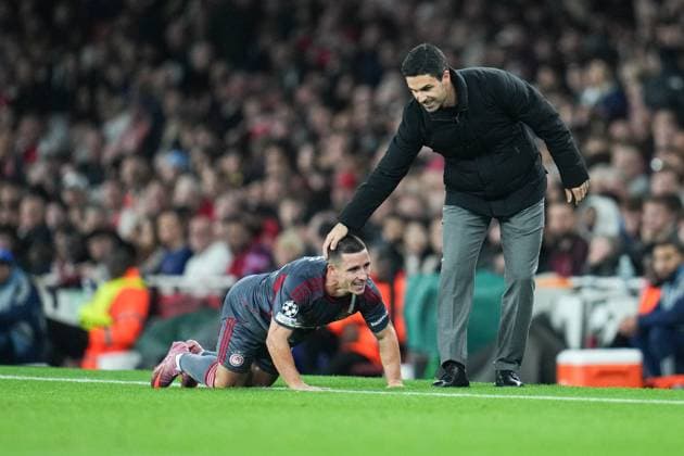 UEFA Champions League Arsenal v Olympiakos FC Mikel Arteta manager of Arsenal and Daniel Podence of Olympiacos during the UEFA Champions League match Arsenal vs Olympiakos FC at Emirates Stadium, London, United Kingdom, 1st October 2025 (Photo by Harvey Murphy News Images) Copyright: xHarveyxMurphy NewsxImagesx
