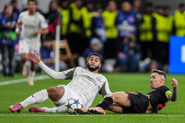2025-10-01 Bayer 04 Leverkusen v PSV Eindhoven - UEFA Champions League 2025 26 League Phase MD2 LEVERKUSEN, GERMANY - OCTOBER 1: Ismael Saibari of PSV Eindhoven tackles Alejandro Grimaldo of Bayer 04 Leverkusen during the UEFA Champions League 2025 26 League Phase MD2 match between Bayer 04 Leverkusen and PSV Eindhoven at BayArena on October 1, 2025 in Leverkusen, Germany. Leverkusen BayArena Germany Content not available for redistribution in The Netherlands directly or indirectly through any third parties. Copyright: xJorisxVerwijstx