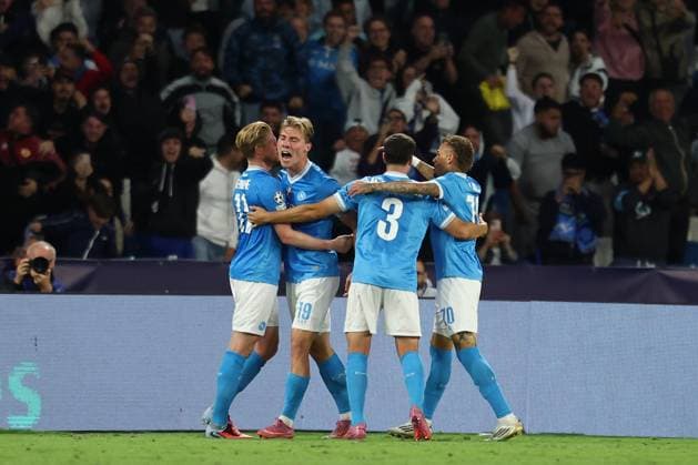 Rasmus Hojlund of SSC Napoli celebrates with team mates after scoring the goal of 2-1 during the UEFA Champions League 2025 2026 football match between SSC Napoli and Sporting CP at Diego Armando Maradona stadium in Naples (Italy), October 01st, 2025. cesarexpurini