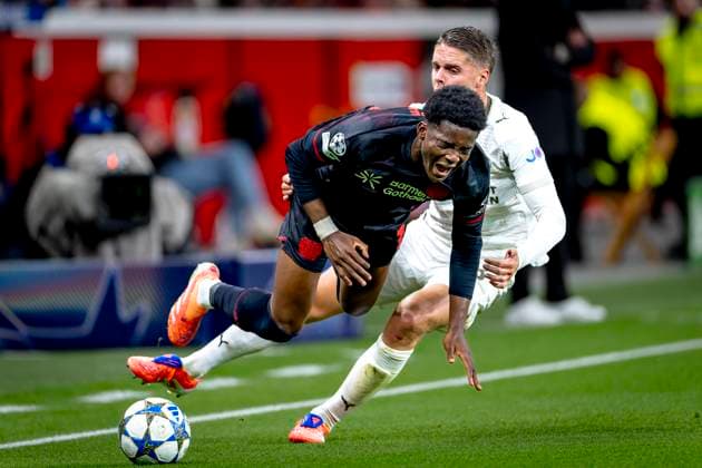 Bayer 04 Leverkusen defender Axel Tape, PSV Eindhoven midfielder Joey Veerman during the match Bayer 04 Leverkusen vs PSV Eindhoven at the Bay Arena for the Champions League - League phase - Matchday 2 season 2025-2026 in LEVERKUSEN, Germany on 20 september 2025, (photo by Marcel van Dorst EYE4images DeFodi Images) Bayer 04 Leverkusen defender Axel Tape, PSV Eindhoven midfielder Joey Veerman during the match Bayer 04 Leverkusen vs PSV Eindhoven at the Bay Arena for the Champions League League phase Matchday 2 season 2025 2026 in LEVERKUSEN, Germany on 20 september 2025, photo by Marcel van Dorst EYE4images DeFodi Images