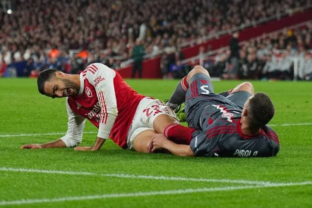 CAPTION CORRECTION: Mikel Merino of Arsenal reacts after colliding with Lorenzo Pirola of Olympiakos Arsenal v Olympiakos, UEFA Champions League, Group Stage, Football, Emirates Stadium, London, UK - 01 Oct 2025London Emirates Stadium United Kingdom EDITORIAL USE ONLY No use with unauthorised audio, video, data, fixture lists, club league logos or live services. Online in-match use limited to 120 images, no video emulation. No use in betting, games or single club league player publications. Copyright: xJoexToth Shutterstockx 15504044bq
