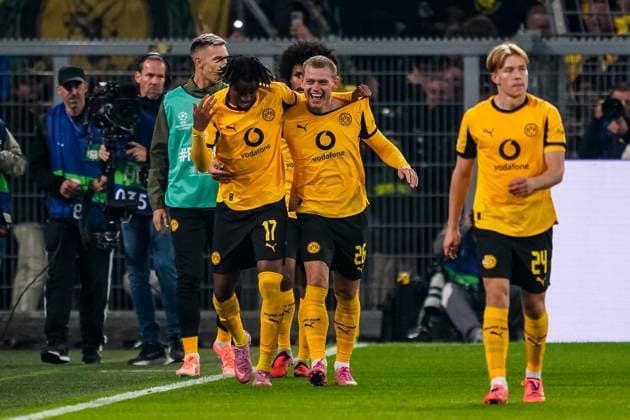 DORTMUND, GERMANY - OCTOBER 1: Carney Chukwuemeka of Borussia Dortmund celebrates with Julian Ryerson of Borussia Dortmund after scoring his team s second goal during the UEFA Champions League 2025 26 League Phase MD2 match between Borussia Dortmund and Athletic Club at BVB Stadion Dortmund on October 1, 2025 in Dortmund, Germany. (Photo by Rene Nijhuis) SPO  Copyright: xRenexNijhuis