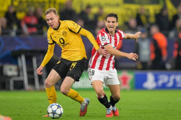Soccer, Champions League, 20251001, BV Borussia Dortmund Athletic Bilbao In the picture from l Maximilian BEIER Dortmund, 14 , Inigo RUIZ DE GALARRETA Bilbao, 16 duel ball Dortmund Signal Iduna Park North Rhine-Westphalia Germany Copyright: Passion2Press MarkusxFischerx