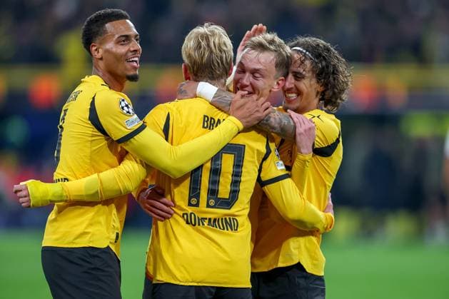 01 10 2025, Football, UEFA Champions League, Borussia Dortmund Athletic Club Bilbao, BVB Stadion, Matchday 2, Season 2025 2026 Goal celebration after the goal to 4 1 by scorer Julian Brandt BVB 10 together with Felix Nmecha BVB 08 Maximilian Beier BVB 14 Fabio Silva BVB 21 Regulations prohibit any use of photographs as image sequences and or quasi video Nordrhein Westfalen Germany