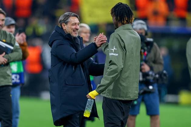 01 10 2025, Football, UEFA Champions League, Borussia Dortmund Athletic Club Bilbao, BVB Stadion, Matchday 2, Season 2025 2026 Closing cheers after BVBs 4 1 win over Bilbao Head coach Niko Kovac BVB hc visibly in a good mood next to Carney Chukwuemeka BVB 17 Regulations prohibit any use of photographs as image sequences and or quasi video Nordrhein Westfalen Germany