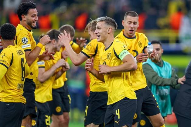 01 10 2025, Football, UEFA Champions League, Borussia Dortmund Athletic Club Bilbao, BVB Stadion, Matchday 2, Season 2025 2026 Final celebration after BVBs 4 1 win against Bilbao Felix Nmecha BVB 08 Ramy Bensebaini BVB 05 Nico Schlotterbeck BVB 04 Waldemar Anton BVB 03 Regulations prohibit any use of photographs as image sequences and or quasi video Nordrhein Westfalen Germany