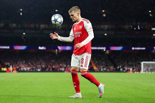 1st October 2025; Emirates Stadium, London, England; Champions League Football, Arsenal versus Olympiakos; Martin Odegaard of Arsenal before taking a corner kick  HenningxvonxJagow