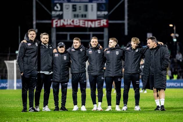 Football, Season 2025 2026, 3 Liga, Donaustadion Ulm, Matchday 9, SSV Ulm 1846 Fußball 1 FC Schweinfurt 05, 01 10 2025 01 10 2025, Football, Season 2025 2026, 3 Liga, Donaustadion Ulm, Matchday 9, SSV Ulm 1846 Fußball 1 FC Schweinfurt 05, Cheers Emotions Joy after the 5 1 home win of the Spatzen The coaching team stands in second row f l Co coach Max Kohlenberg SSV Ulm 1846 Fußball , Team doctor Dr. Alexander Henze SSV Ulm 1846 Football , Coach Emilio Tancredi SSV Ulm 1846 Football , Interim coach Moritz Glasbrenner SSV Ulm 1846 Football , Athletic coach Tim Gulde SSV Ulm 1846 Football , Physio Raimund Felber SSV Ulm 1846 Football , Analyst Patrick Waltenberger SSV Ulm 1846 Football , Goalkeeper coach Holger Betz SSV Ulm 1846 Football Photo Lucca Fundel Ulm Donaustadion Baden Württemberg Germany
