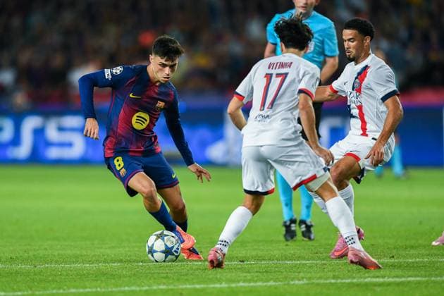 FC Barcelona, Barca v PARIS SAINT-GERMAIN OLIMPIC STADIUM LLUIS COMPANYS. MONTJUIC,BARCELONA. October 1,2025 FC BARCELONA vs PARIS SAINT-GERMAIN October 1,2025 Pedri (8) of FC Barcelona dribbles Vitinha (17) of PSG during the soccer match corresponding to the second match of the group stage of the UEFA Champions League between FC Barcelona and Paris Saint-Germain at Olimpic Stadium Lluis Companys of MontjuÃ¯c in Barcelona, Spain. Barcelona ESP Copyright: xS.xRosx
