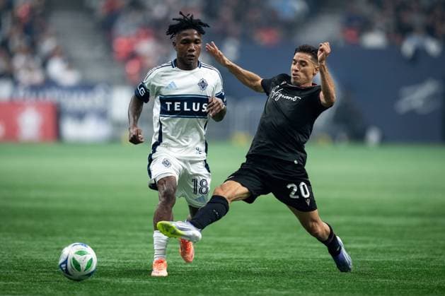 October 1, 2025, Vancouver, Bc, CANADA: Vancouver Whitecaps Edier Ocampo (18) and Vancouver FC s Nicolas Mezquida (20) vie for the ball during the first half of the Canadian Championship final soccer match, in Vancouver, on Wednesday, October 1, 2025. Canada News - October 1, 2025  - ZUMAc35_ 20251001_zaf_c35_182 Copyright: xEthanxCairnsx