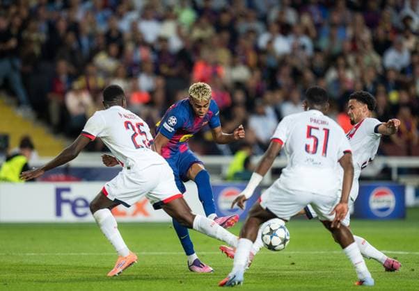 (251002) -- BARCELONA, Oct. 2, 2025 -- Lamine Yamal (2nd L) of FC Barcelona, Barca vies with Nuno Mendez (1st L) and Zaire-Emery (1st R) of Paris Saint Germain during the UEFA Champions League group stage 2nd round match between FC Barcelona and Paris Saint Germain (PSG) in Barcelona, Spain, Oct. 1, 2025. (Photo by Xinhua) (SP)SPAIN-BARCELONA-FOOTBALL-UEFA CHAMPIONS LEAGUE-FC BARCELONA VS PSG JoanxGosa 