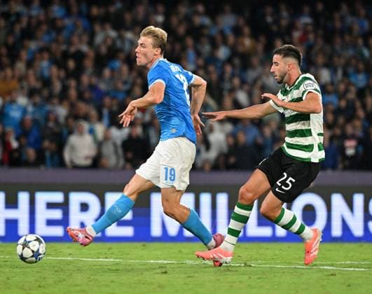 (251002) -- NAPLES, Oct. 2, 2025 -- Napoli s Rasmus Hojlund (L) scores during the UEFA Champions League group stage 2nd round match between Napoli and Sporting CP in Naples, Italy, Oct. 1, 2025. (Photo by Xinhua) (SP)ITALY-NAPLES-FOOTBALL-UEFA CHAMPIONS LEAGUE-NAPOLI VS SPORTING CP AlbertoxLingria 
