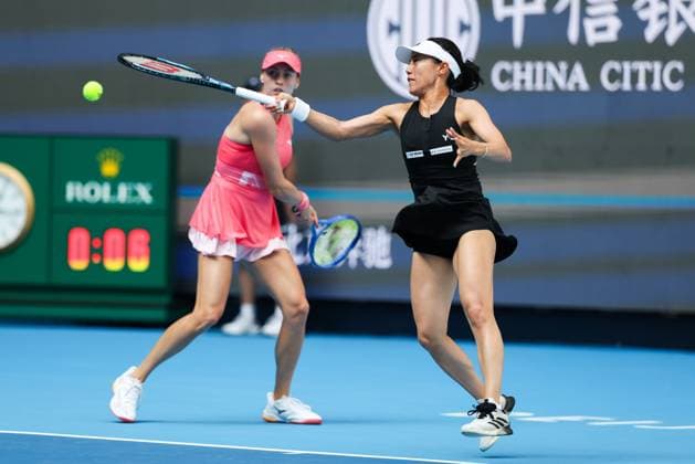 BEIJING, CHINA - OCTOBER 02: Miyu Kato of Japan and Fanny Stollar of Hungary compete in the Women s Doubles Quarterfinal match against Timea Babos of Hungary and Luisa Stefani of Brazil on day 11 of the 2025 China Open at the National Tennis Center on October 2, 2025 in Beijing, China.  Copyright: xVCGx 111594593212