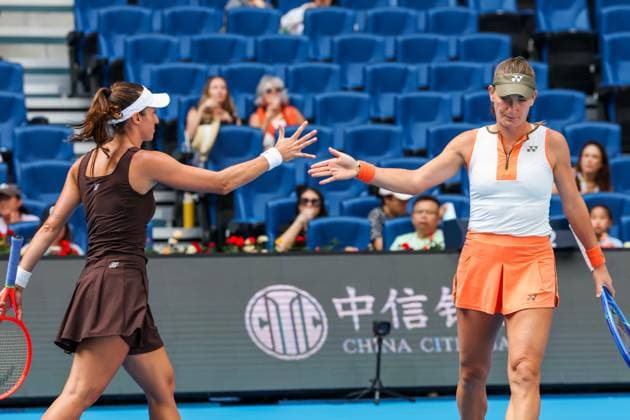 BEIJING, CHINA - OCTOBER 02: Timea Babos of Hungary and Luisa Stefani of Brazil react in the Women s Doubles Quarterfinal match against Miyu Kato of Japan and Fanny Stollar of Hungary on day 11 of the 2025 China Open at the National Tennis Center on October 2, 2025 in Beijing, China.  Copyright: xVCGx 111594596160