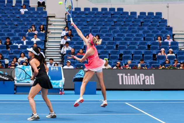 BEIJING, CHINA - OCTOBER 02: Miyu Kato of Japan and Fanny Stollar of Hungary compete in the Women s Doubles Quarterfinal match against Timea Babos of Hungary and Luisa Stefani of Brazil on day 11 of the 2025 China Open at the National Tennis Center on October 2, 2025 in Beijing, China.  Copyright: xVCGx 111594596044