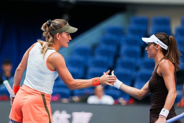 BEIJING, CHINA - OCTOBER 02: Timea Babos of Hungary and Luisa Stefani of Brazil react in the Women s Doubles Quarterfinal match against Miyu Kato of Japan and Fanny Stollar of Hungary on day 11 of the 2025 China Open at the National Tennis Center on October 2, 2025 in Beijing, China.  Copyright: xVCGx 111594593238