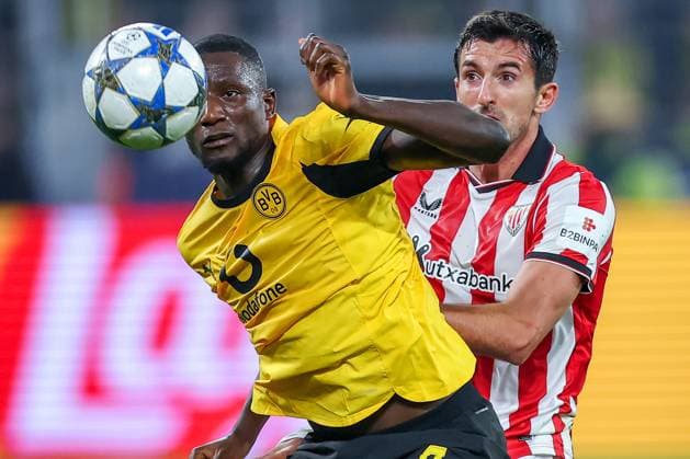 01 10 2025, Football, UEFA Champions League, Borussia Dortmund Athletic Club Bilbao, BVB Stadion, 2 Matchday, Season 2025 2026 Serhou Guirassy BVB 09 in duel against Dani Vivian Bilbao 03 Regulations prohibit any use of photographs as image sequences and or quasi video Nordrhein Westfalen Germany